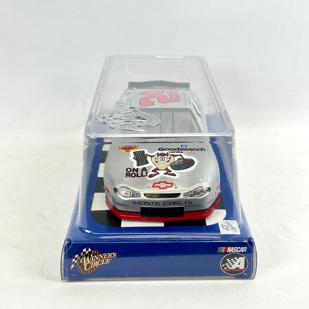 Model car in clear packaging with visible branding on a white background