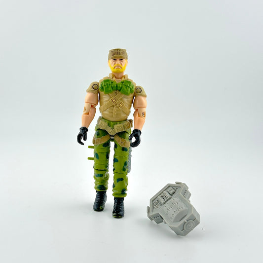 GI Joe action figure with accessory on white background. 