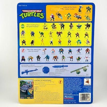 Back of a Teenage Mutant Ninja Turtles action figure packaging with character illustrations and accessories.