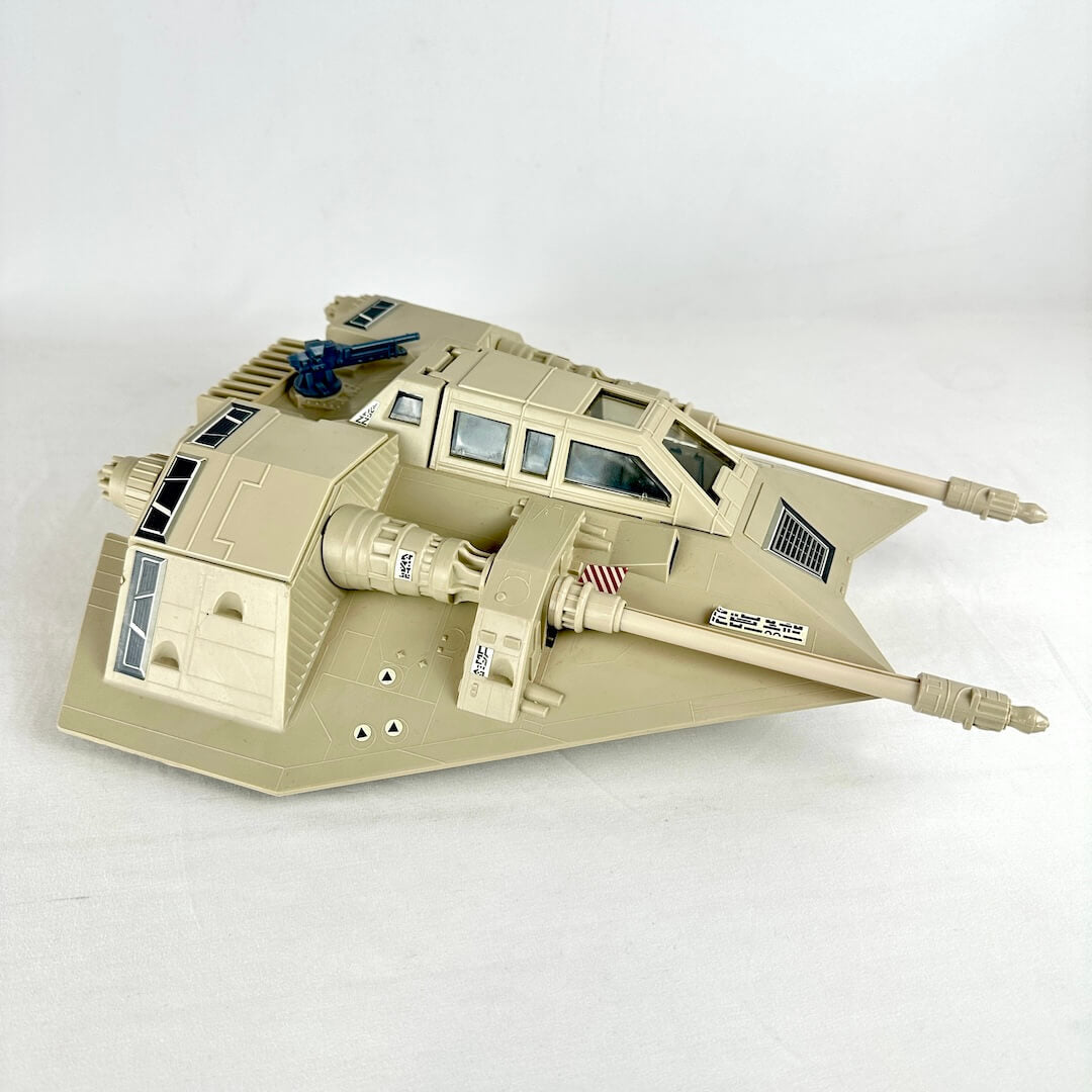 Toy snowspeeder model/toy on a white background, side view. 