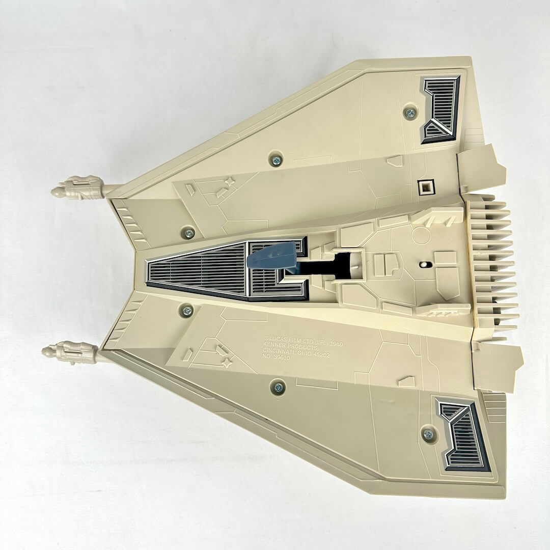 Toy snowspeeder model/toy on a white background, underside view. 
