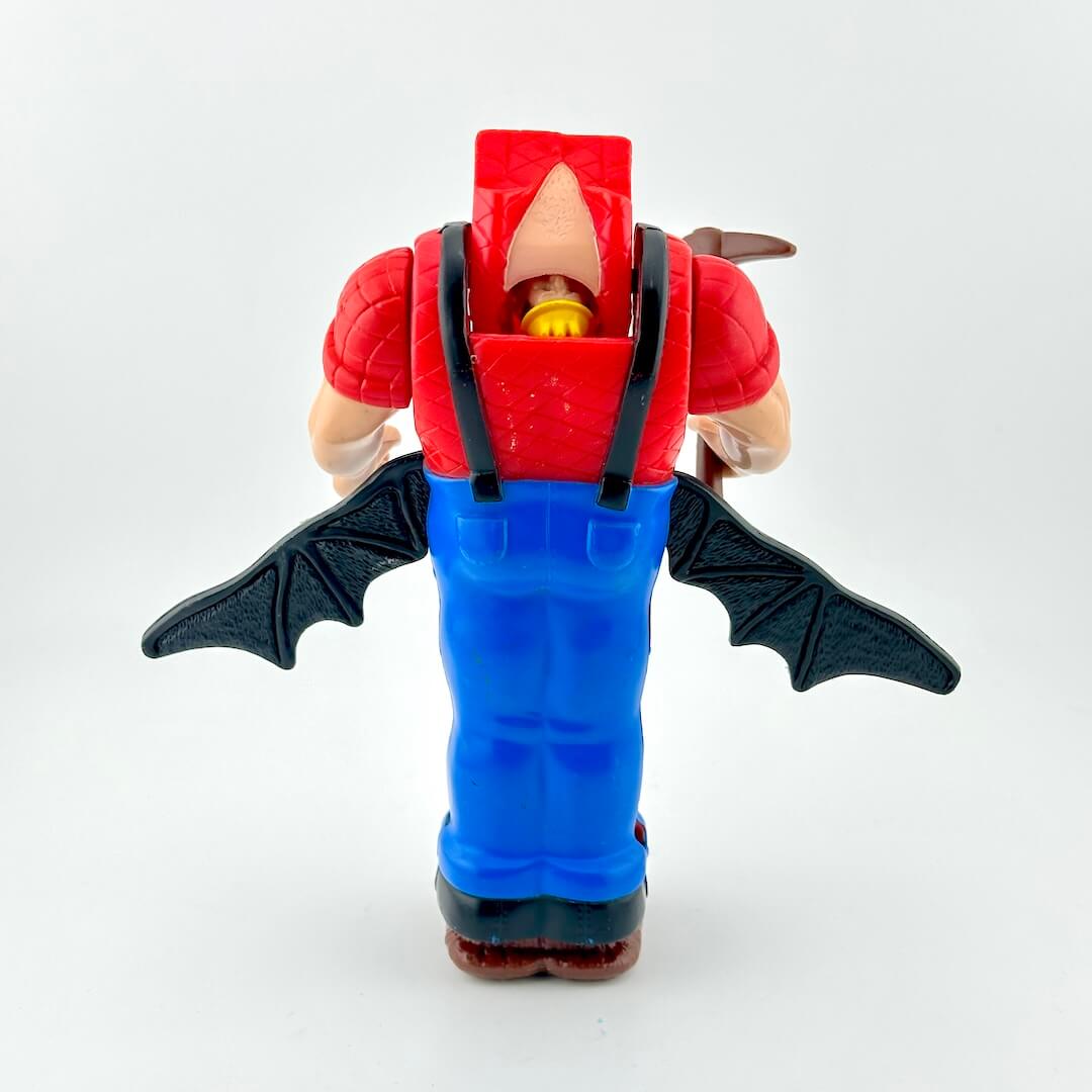 Toy figure with red top, blue body, and black wings on a white background