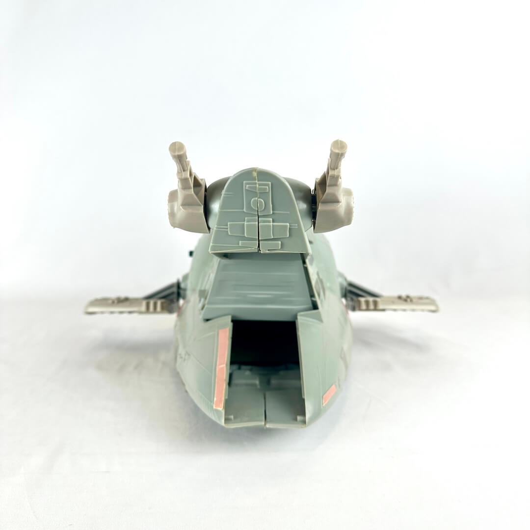 Toy spaceship model on a white background