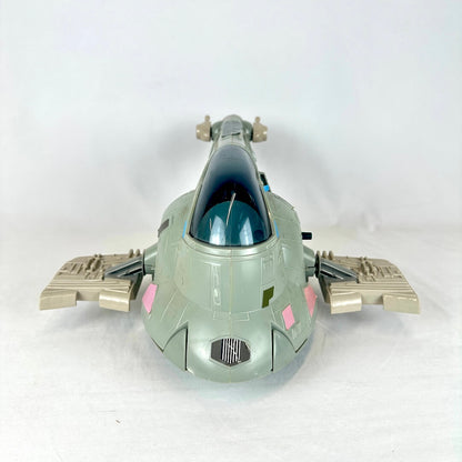 Toy spaceship model on a white background