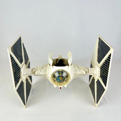 Front view of ship with cockpit doors open, one sticker missing off right wing. 