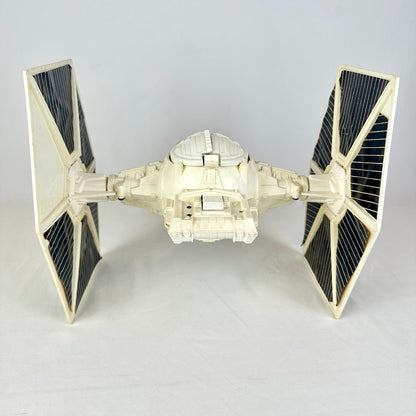 Back view of ship with sphere cockpit and hexagonal wings on either side. 