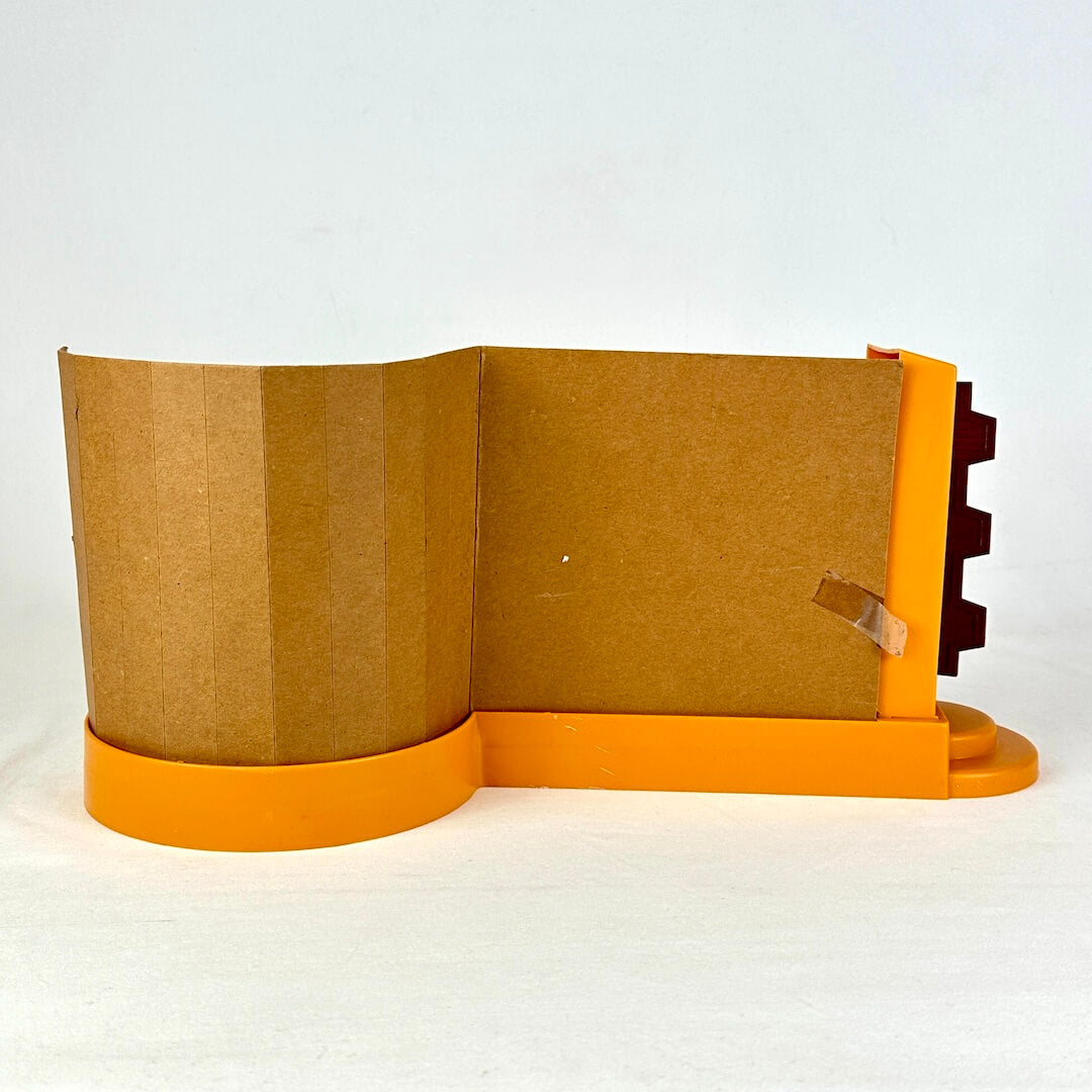 Star Wars Cantina playset with orange base and background with colorful characters against white backdrop. Backside.