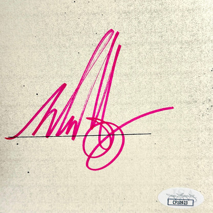 Pink signature on a textured beige background