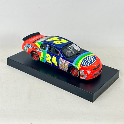 Diecast car with number 24 and Dupont branding. 