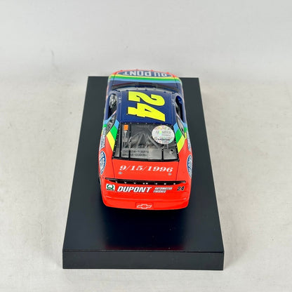 Back view of diecast car with Dupont branding. 