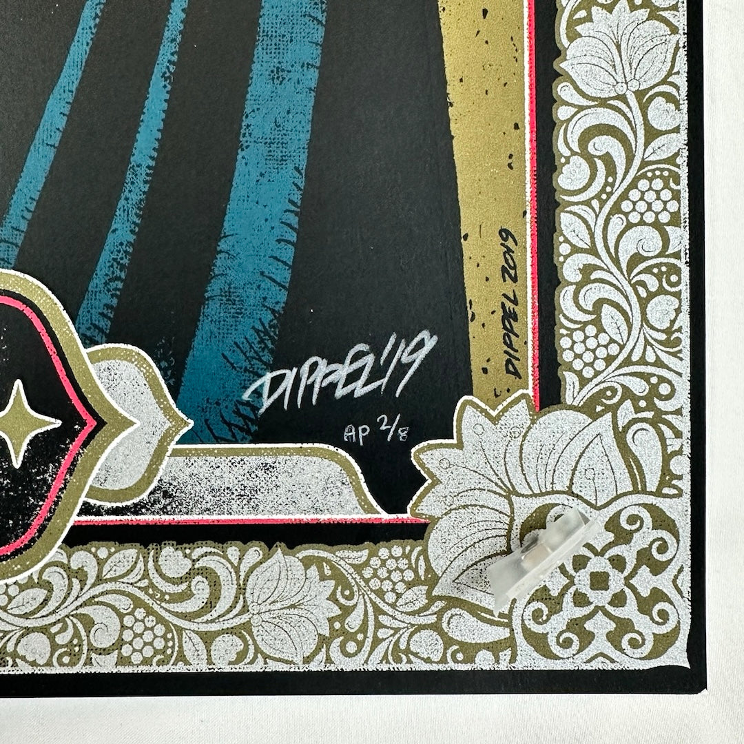 Close up of bottom right corner with artist signature and number. 