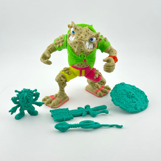 Action figure of anthropomorphized toad with bright clothes and teal accessories. 