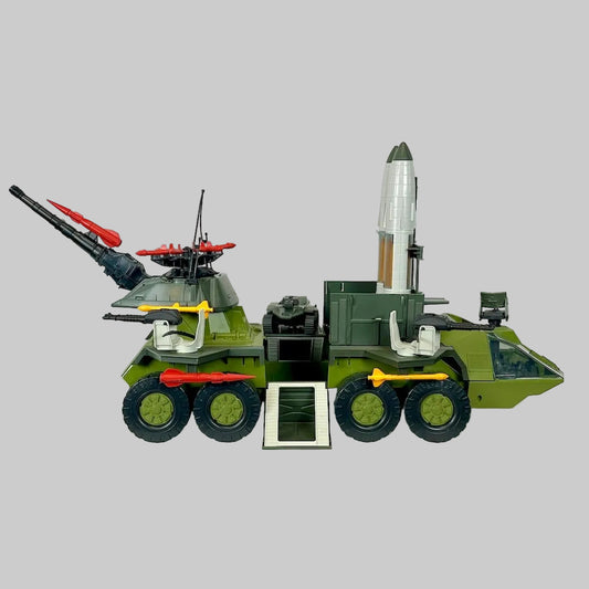 Toy military vehicle with a rocket on a white background