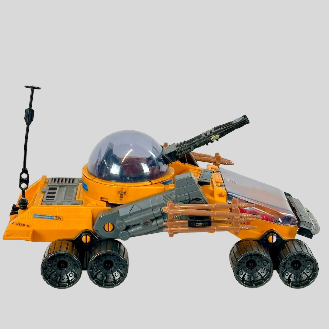 Toy vehicle with a robot head on a white background