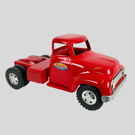 Red toy truck with a visible brand logo on a white background