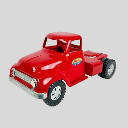 Red toy truck with a visible brand logo on a white background