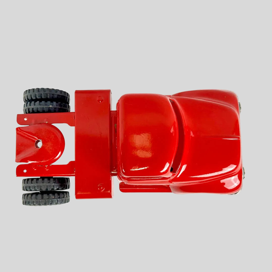 Red toy truck on a white background