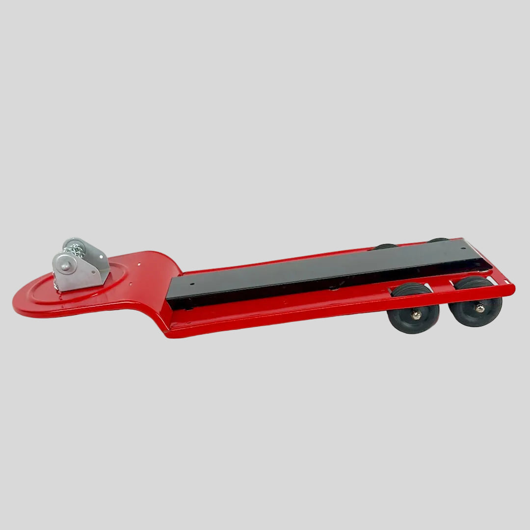 Red and black toy trailer on a white background