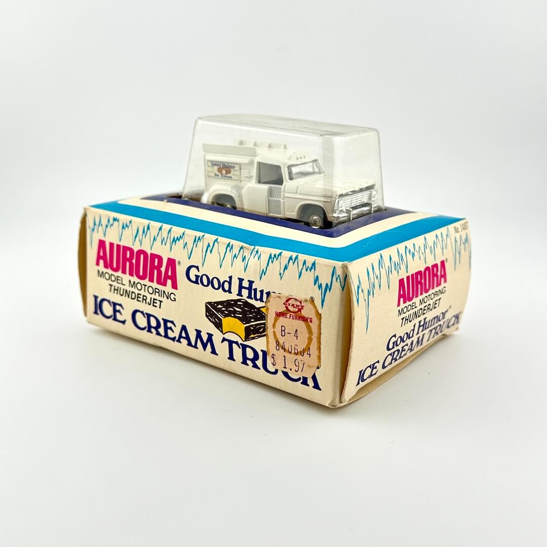 Model ice cream truck in packaging with Aurora branding on a white background