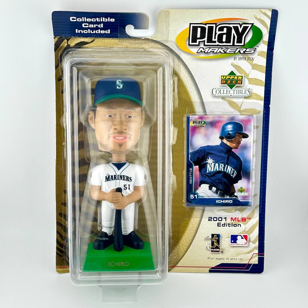 Baseball bobblehead figure with a trading card in packaging, featuring the Seattle Mariners uniform.