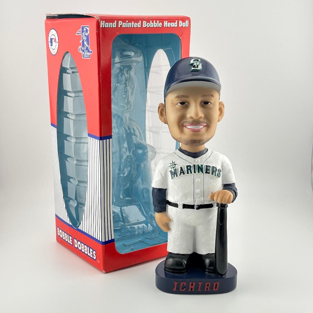 Baseball bobble head doll with packaging on a white background