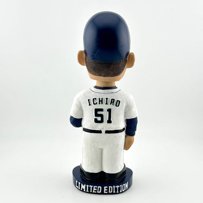 Bobblehead figure of a baseball player in a white uniform with 'Ichiro' and number '51', wearing a navy helmet, on a white background.