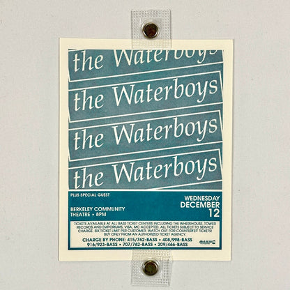 Poster for 'the Waterboys' event with blue and white design on a gray background