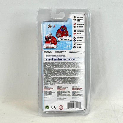Toy figure packaging with branding and product details on a gray background