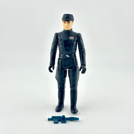A Star Wars action figure of a man in military uniform with weapon at feet against white background.