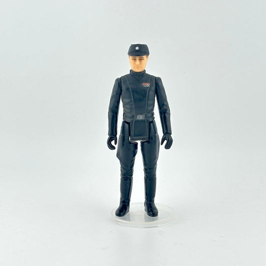 Action figure in a dark blue military uniform with a cap on a white background
