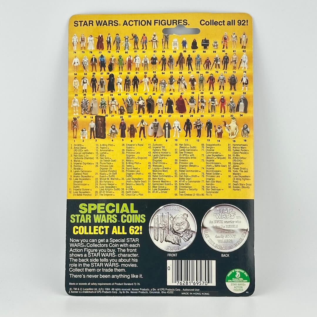 Star Wars action figure packaging with character list and coins on a yellow background
