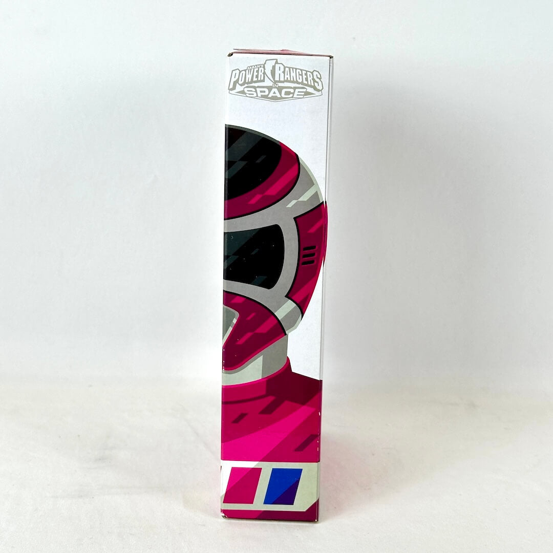 Side view of packaging with illustration of Pink Ranger under the Power Rangers logo. 