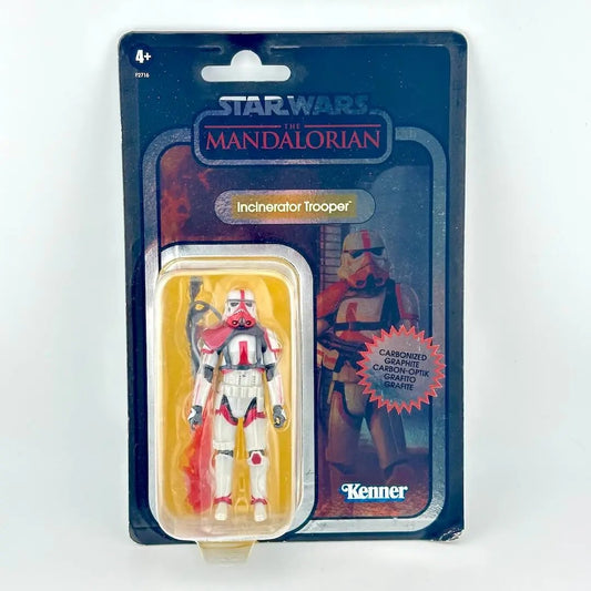 Star Wars action figure in its original blister packaging with metallic card back; figure in white and orange armor.