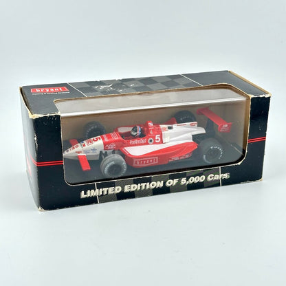 Model race car in a box with 'bryant' branding on a white background