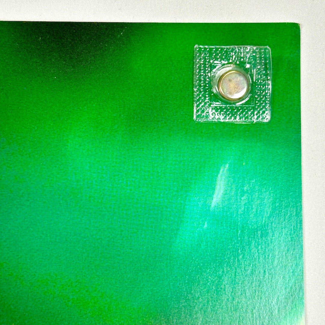 Top right corner with clean edges and a slightly dulled corner. 