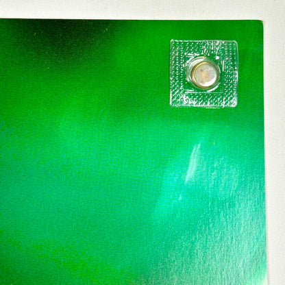 Top right corner with clean edges and a slightly dulled corner. 