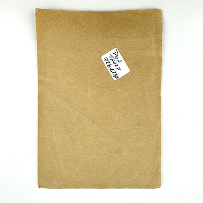 Backside of pass to show intact backing and small sticker in center.