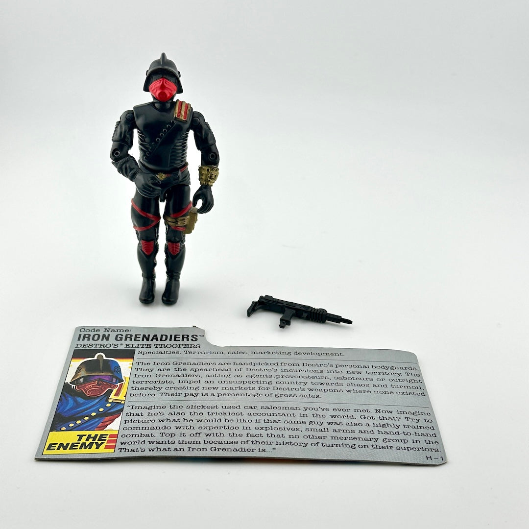 G.I. Joe action figure with character card against white background.