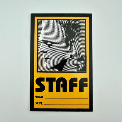 Staff ID card with a stylized Frankenstein portrait on a yellow background