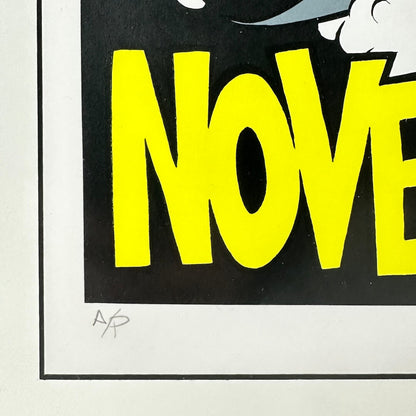 Yellow text spelling 'NOVEMBER' on a black background with comic book style border. Pencil "A/P" in corner. 