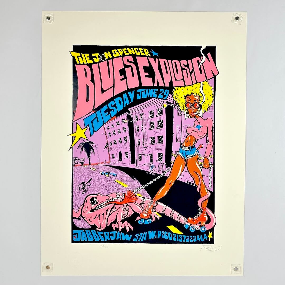 Colorful poster for 'The John Spencer Blues Explosion' event with a cartoon character and cityscape.