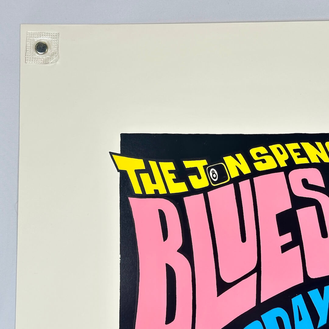 Top left corner of poster showing crisp edges and corner. 