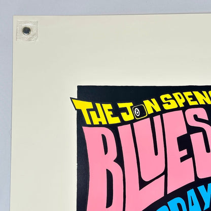 Top left corner of poster showing crisp edges and corner. 