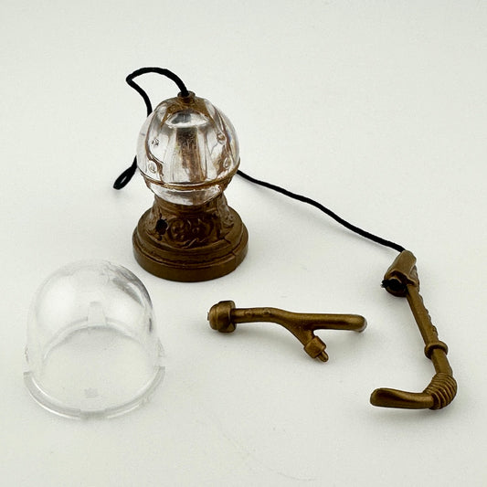 Clear globe in two pieces with bronze attachments and thread attaching one bronze piece to the main globe. 