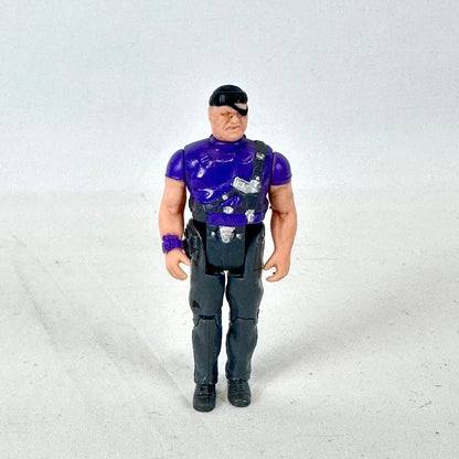 A vintage action figure of a muscular man with an eyepatch, wearing a purple shirt, black vest, and dark pants.