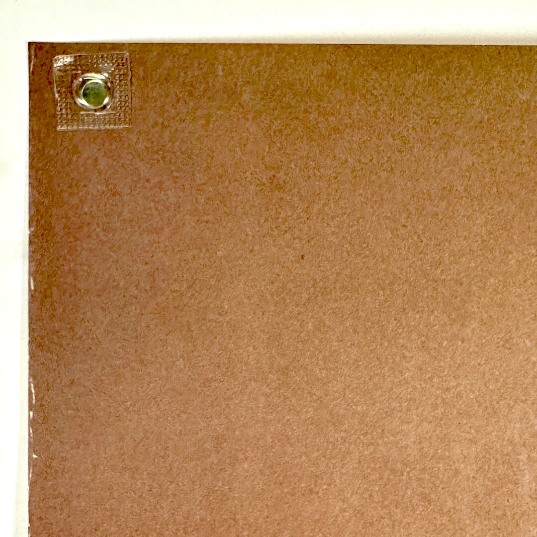 Top left corner with some wear to left edge. 