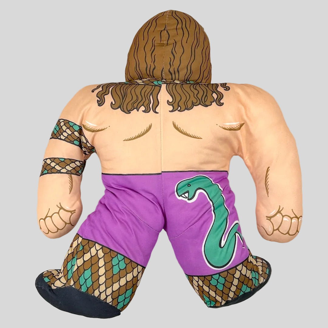 Plush toy resembling a character with purple shorts featuring a green snake design on a white background