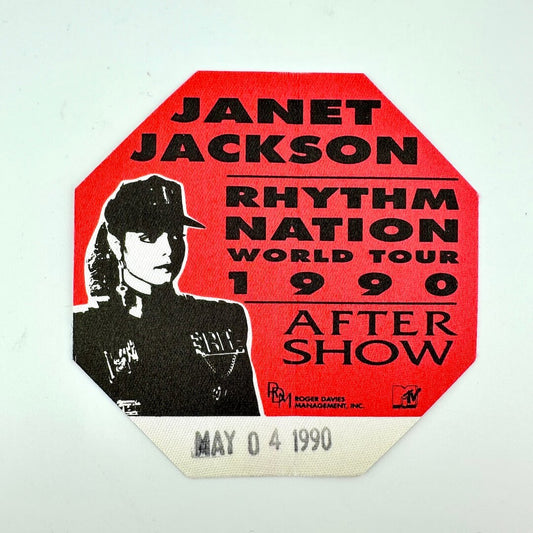 Octagonal event ticket with red background and black picture of Jackson and black text against white background.