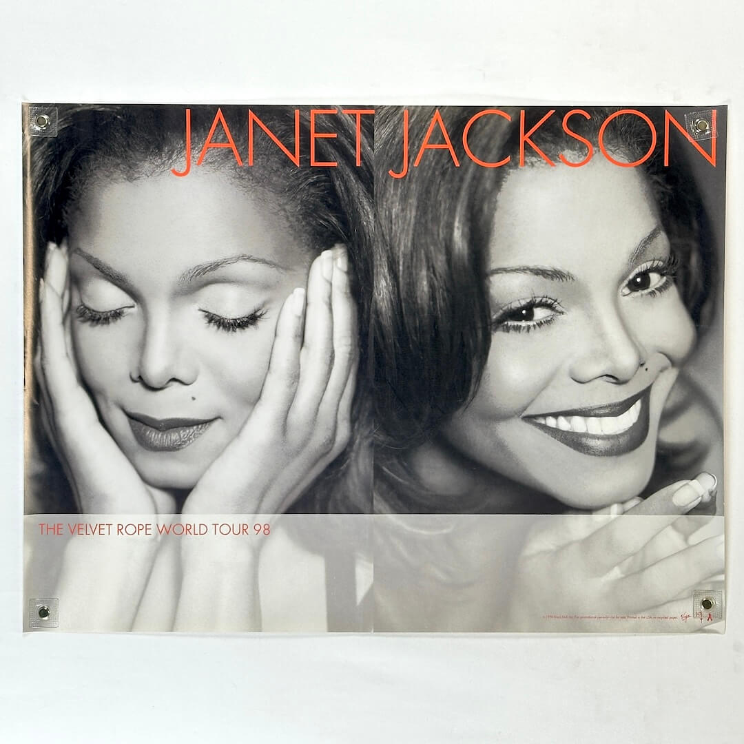 Janet Jackson poster with black and white photo of a woman and text 'Janet Jackson' and 'The Velvet Rope World Tour 98'.