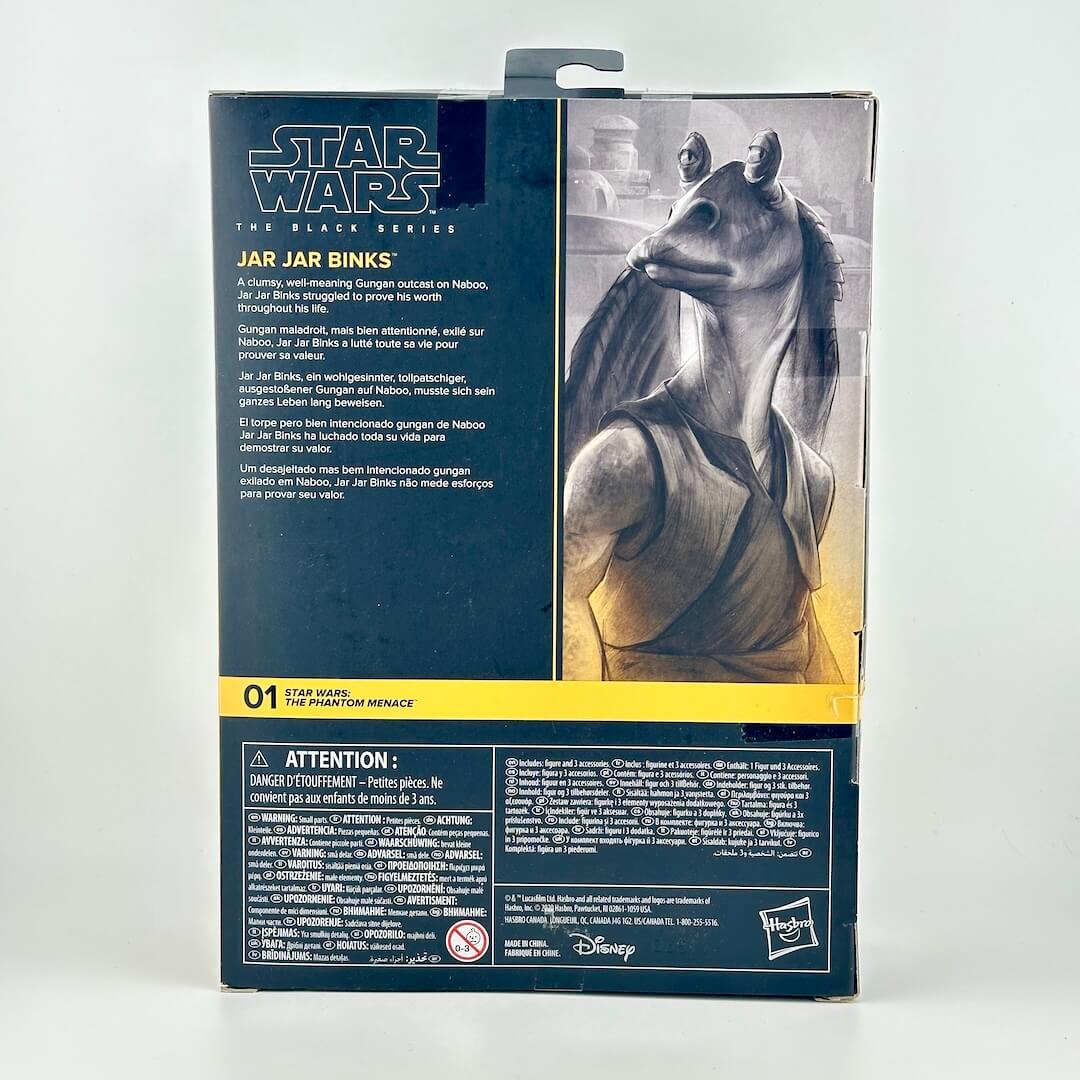 Back of Star Wars action figure packaging showing character art and product details. 
